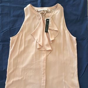 Classy sleeveless sheer blouse